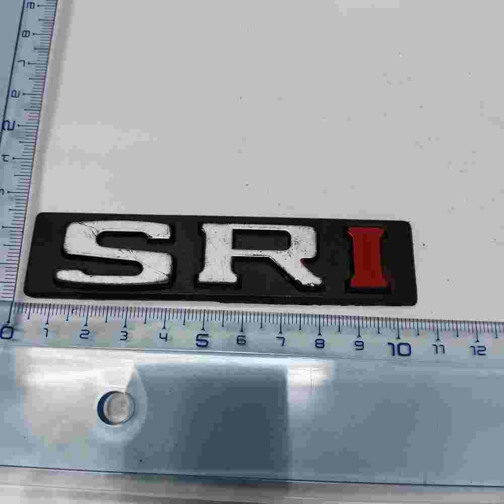 Emblema   Opel Corsa D Astra H Vectra C Zafira B SRI 10.5cm.
