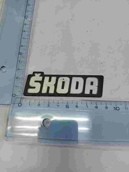 Emblema Skoda Favorit 9 cm.