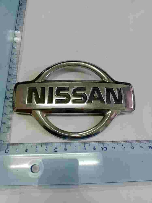 Emblema Nissan Almera 62890BM400 62890 BM400 14 cm. 9cm.