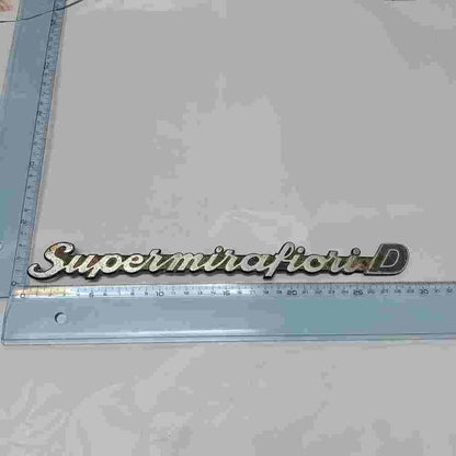 Emblema  Fiat 131 Supermirafiori D 29cm.
