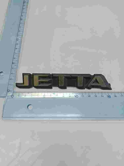 Emblema  VW Volkswagen Jetta 165853687B 165 853 687 B 15.5cm.
