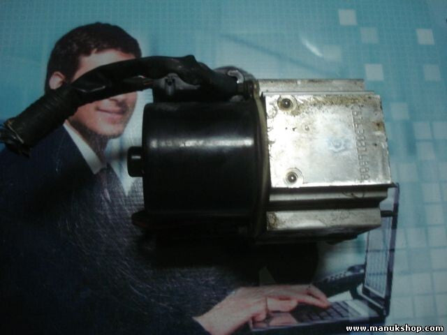 Unidad hidráulica del ABS Kia Sportage 0K08A43780 K03062X