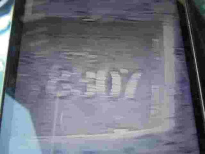 Emblema trasero Toyota Carina 8307