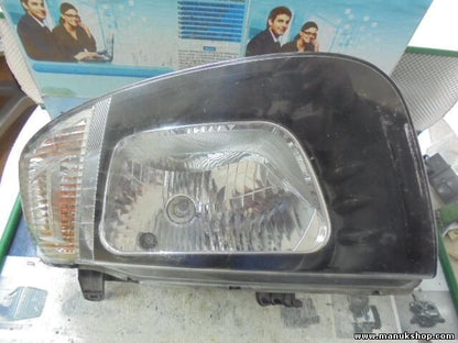 Faro delantero izquierdo Mitsubishi L200 2008 8301B009
