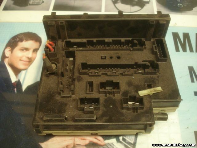 Caja de fusibles Ford Escort 97AG14A073DB