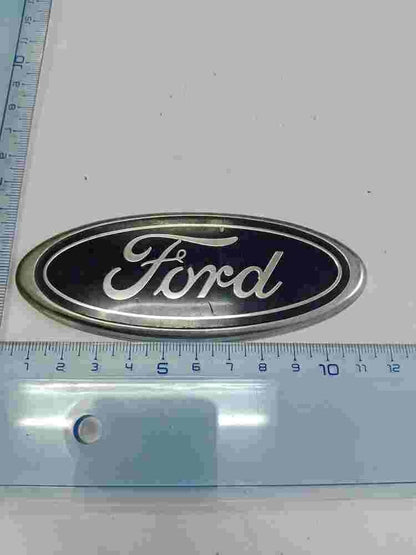 Emblema Ford Fiesta Mondeo 95FBV425A52AA 95FB-V425A52-AA B45SA