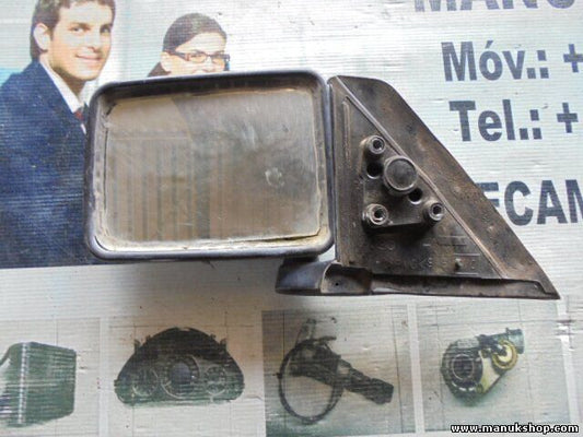 Espejo retrovisor exterior izquierdo manual Pajero Montero Sport  E2024010