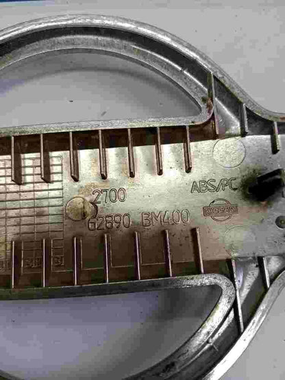 Emblema Nissan Almera 62890BM400 62890 BM400 14 cm. 9cm.