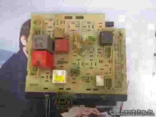 Caja de fusibles Ford Escort 94AG14A073AA