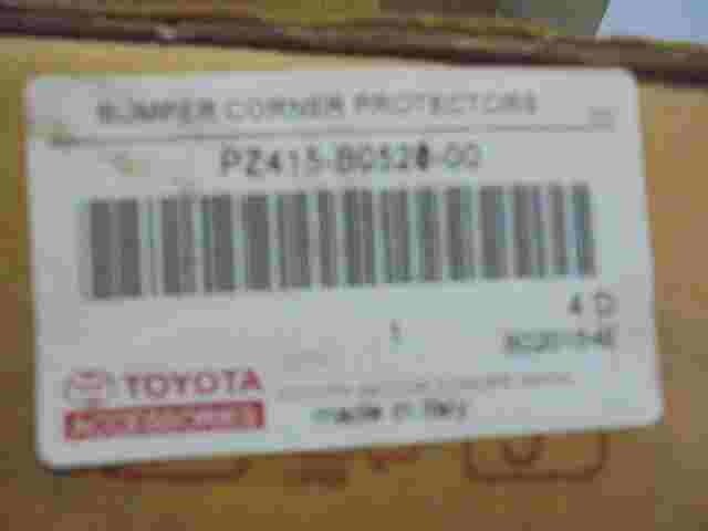 Moldura de parachoques trasero izquierdo Toyota Yaris PZ415B052000 PZ415-B052000