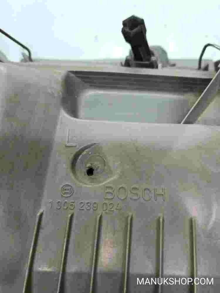 Faro delantero izquierdo Mercedes-Benz W124 BOSCH 1305235093 1305239024