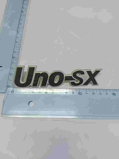 Emblema Fiat Uno SX 13cm.
