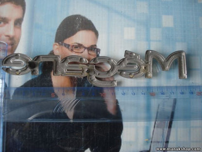 Emblema trasero Renault Megane 7700845989 19cm