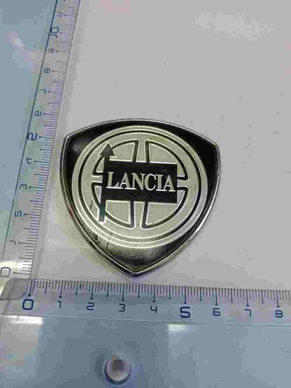 Emblema Lancia C403 ABS 46444547 2 5cm.