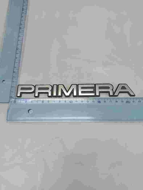 Emblema Nissan Primera 21 cm.