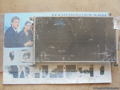 Condensador radiador aire acondicionado Nissan 921100F010 92110 0F010 5971165410